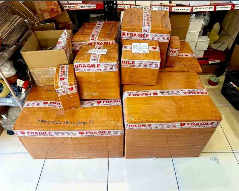 Lakban fragile untuk keamanan parfum